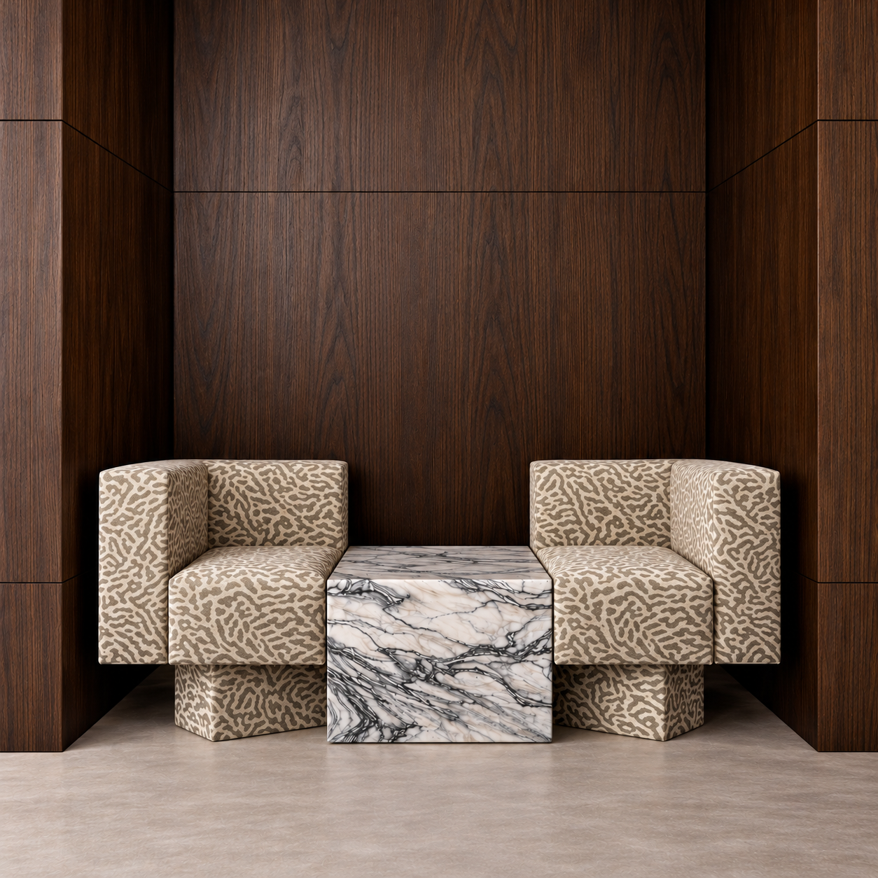 Hotel waiting room with patterned armchairs and a veined marble table by Studio IB Milano