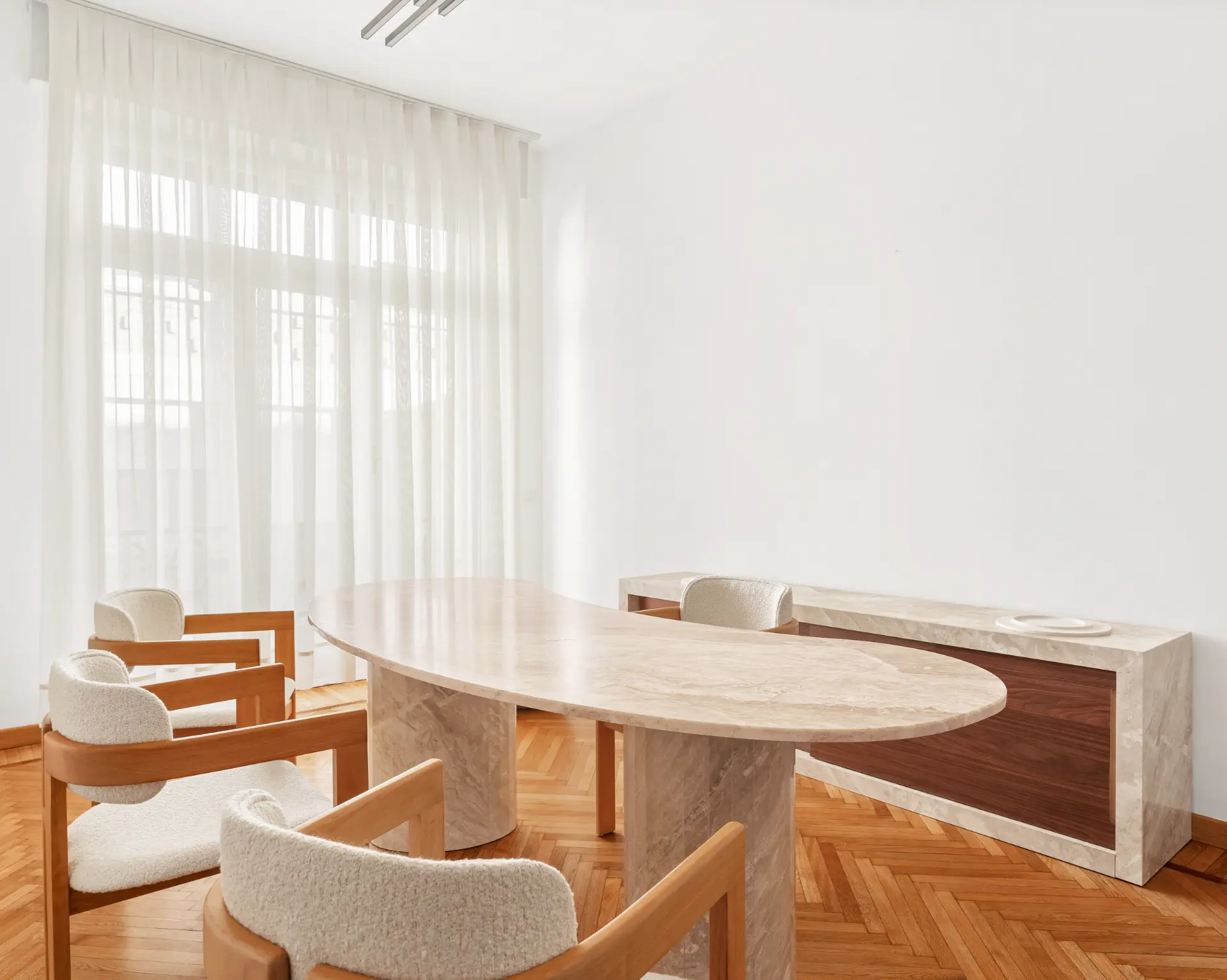 Minimal private office in Brera with stone desk by Studio IB Milano
