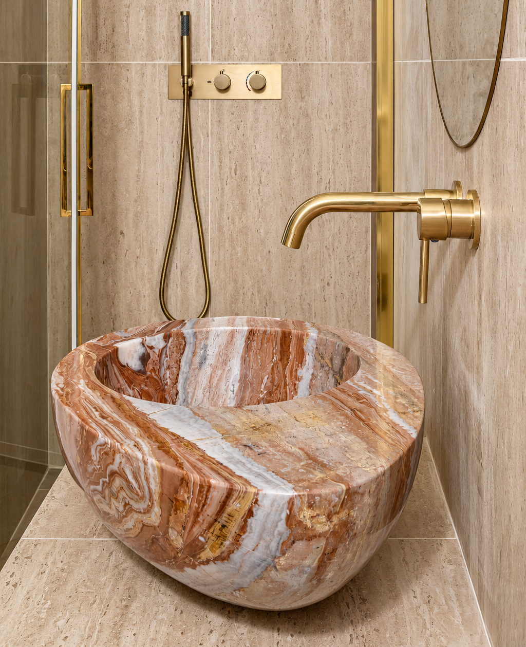 Uovo carved marble washbasin with brass fittings by Studio IB Milano