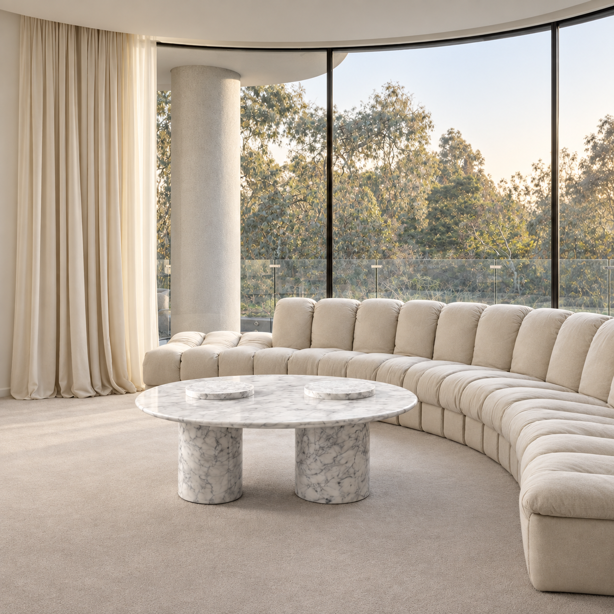 Private villa living room in Monte Carlo with curved ivory sofa and marble coffee table by Studio IB Milano
